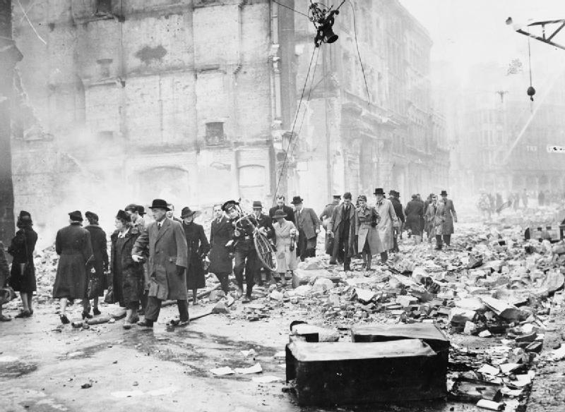 Awe-Inspiring Keep calm and carry on 1 A black and white photograph of office workers making their way to work through debris after a heavy air raid