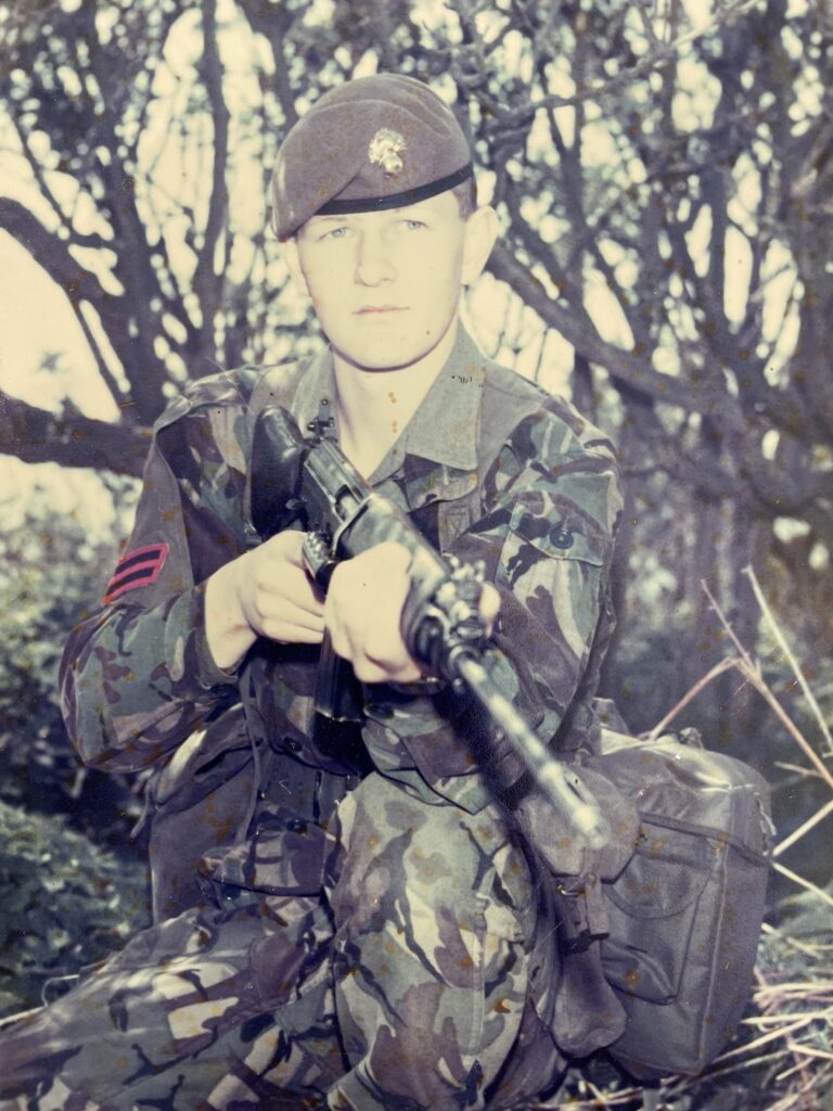 Paul Holmes - Incredible Member Profile 1 A picture of Junior Leader Corporal Paul Holmes Grenadier Guards wearing combats and holding a SLR