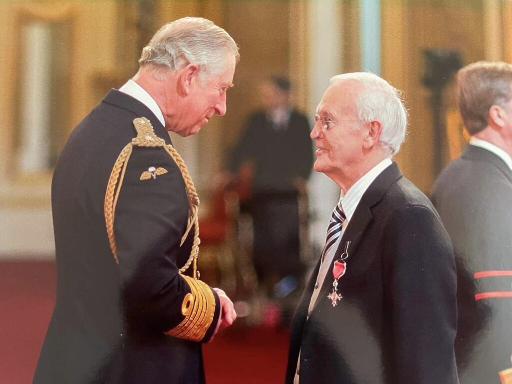 Colin Gurnett - Incredible Member Profile 6 A picture of Colin Gurnett receiving his MBE from Prince Charles at Buckingham Palace