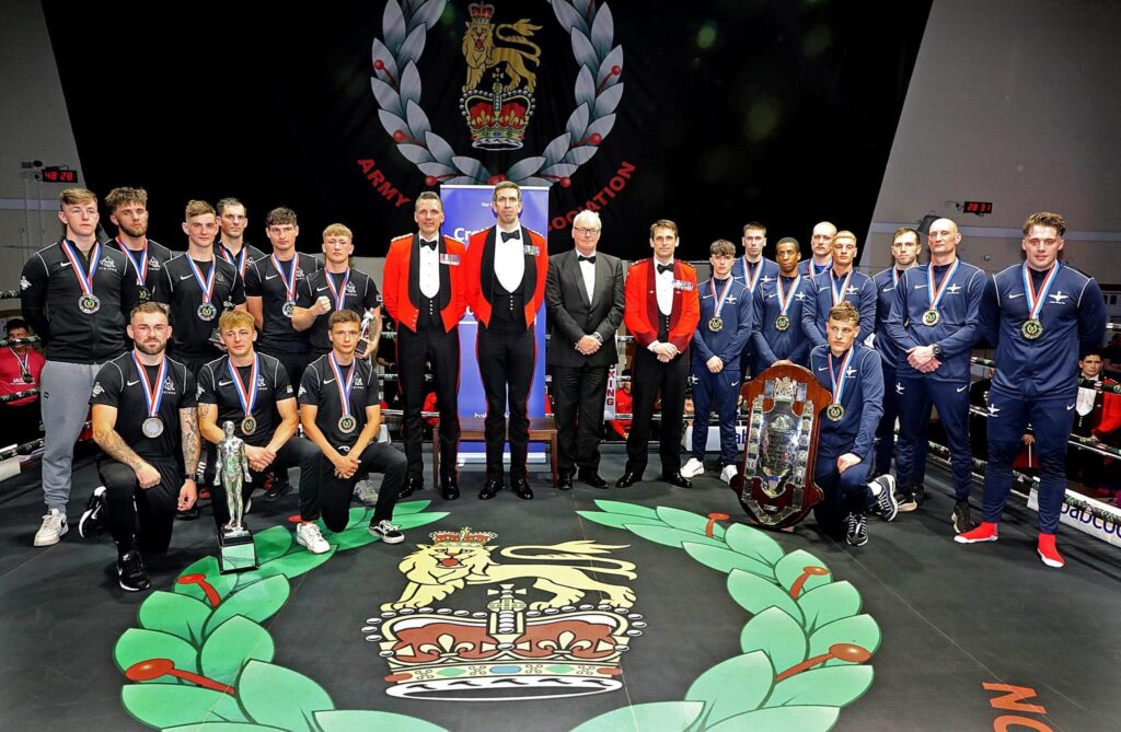 Sensational Army Boxing Championships 3 A photo of both boxing team finalists in tracksuits wearing their respective gold or silver medals