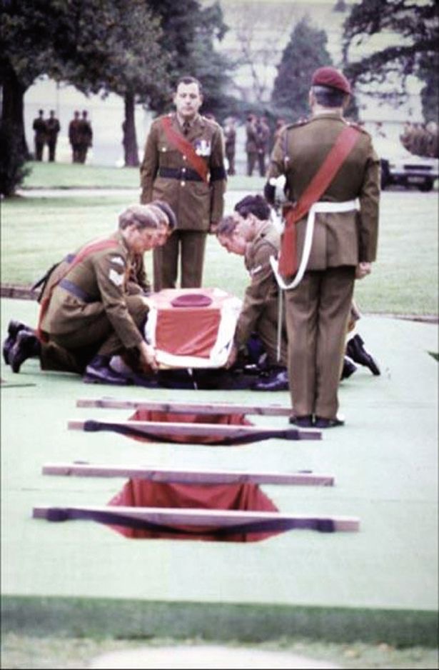 Powerful Part 6 Orders - Date for your diary 2 An image of the coffin of Sergeant Ian McKay VC being rested on two pieces of wood over his burial plot by his six coffin bearers. In the picture facing the coffin his Company Sergeant Major John Weeks BEM, B Company’s ‘Company Sergeant Major’ on Mount Longdon. Coffin Bearers that can be seen include; Sergeant Des Fuller, took over four platoon from Ian McKay, Lance Corporal Lenny Carver Mentioned in Dispatches and Colour Sergeant Tony Dunn