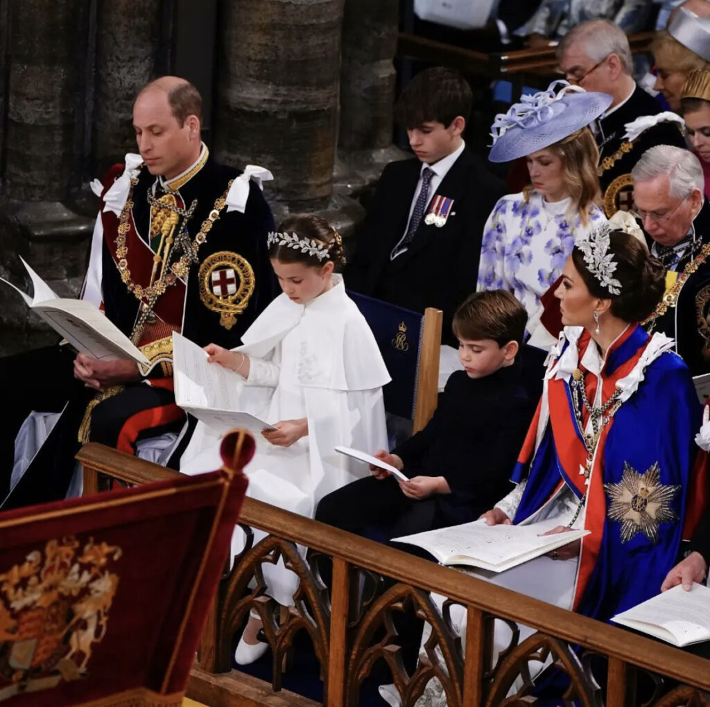 The Majestic and Sensational Coronation in Pictures - GSTK 5 A picture of Prince William and Kate both in ceremonial dress with their children Charlotte and Louis