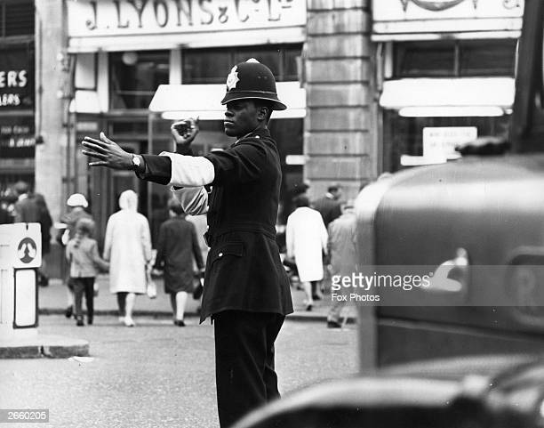 Norwell Roberts QPM - Incredible Member Profile 1 Norwell Roberts QPM - A black and white image of London's first black police officer, Police Constable Norwell Roberts aka Norwell Gumbs, on point duty near Charing Cross Station, London, 9th September 1968. (Photo by Fox Photos/Hulton Archive/Getty Images)