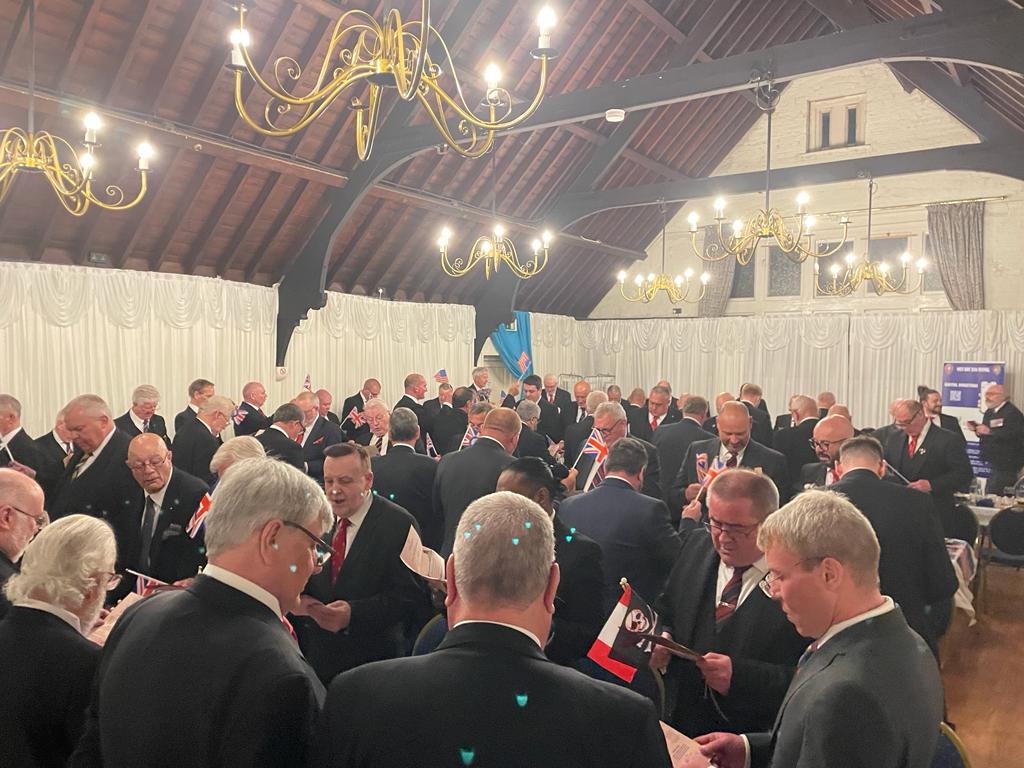 Military Lodge June remarkable meeting 23 An image of the brethren at the Beauchamp Lodge June 2023 festive board singing some traditional hymns at the end of the evening