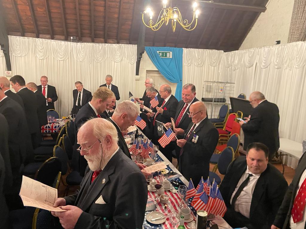 Military Lodge June remarkable meeting 25 An image of the brethren at the Beauchamp Lodge June 2023 festive board singing some traditional hymns at the end of the evening and waving their hand flags